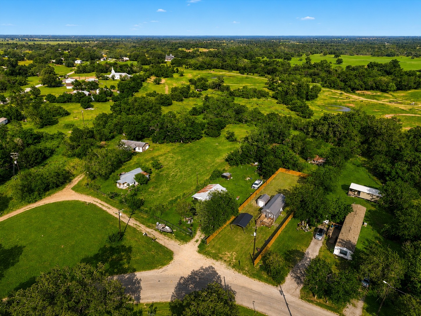 189 Watterson Road Bastrop, TX 78602 - Photo 22 of 22 Beautiful aerial view with pastures, trees and rural views for miles.