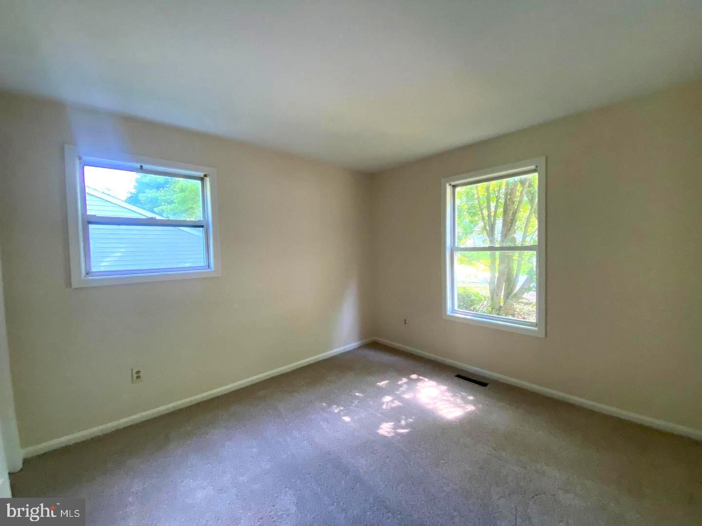 12119 Gringo Road Lusby, MD 20657 - Photo 17 of 20 an empty room with a window