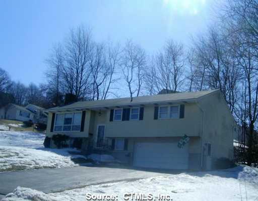 26 Trumpet Brook Road Waterbury, CT 06708 - Photo 1 of 1 a view of a house with a yard