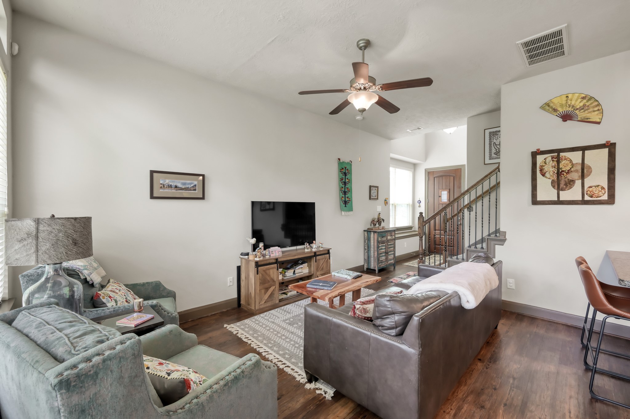 18 Aventura Place Spring, TX 77389 - Photo 9 of 43 a living room with furniture and a flat screen tv
