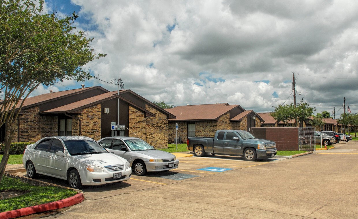 1749 East Henderson Road Angleton, TX 77515 - Photo 2 of 6 a car parked in front of a house