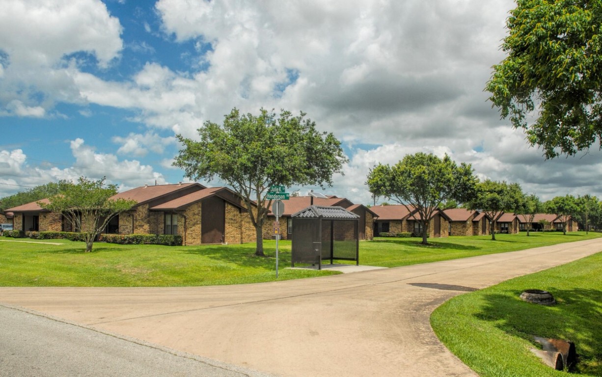 1749 East Henderson Road Angleton, TX 77515 - Photo 3 of 6 a front view of house with yard and green space