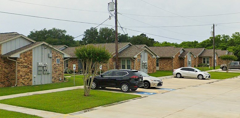 1749 East Henderson Road Angleton, TX 77515 - Photo 4 of 6 a view of a car parked in front of house