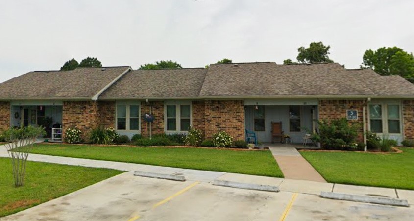 1749 East Henderson Road Angleton, TX 77515 - Photo 5 of 6 a front view of a house with a yard