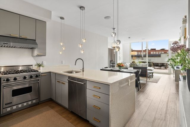 a bedroom with a bed and a desk