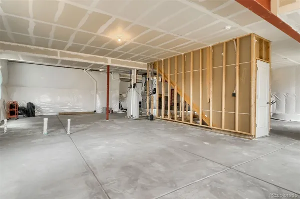 a view of a room with wooden walls