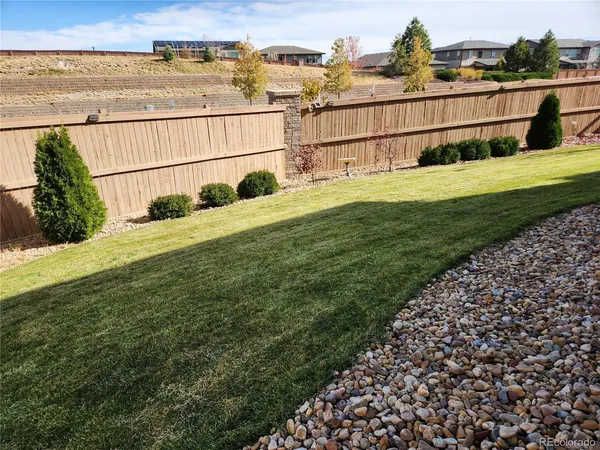 a view of a terrace with a garden