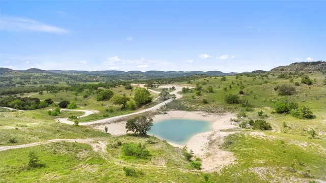 a view of a lake with a mountain