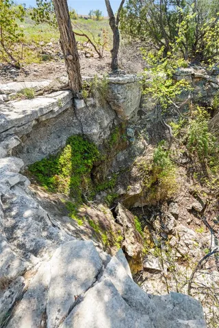 a view of swimming pool with a patio