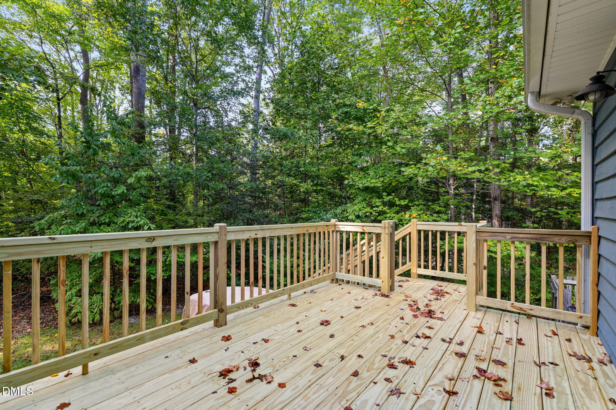 1873 Mill Creek Road Clarksville, VA 23927 - Photo 11 of 50 a balcony with wooden floor and fence