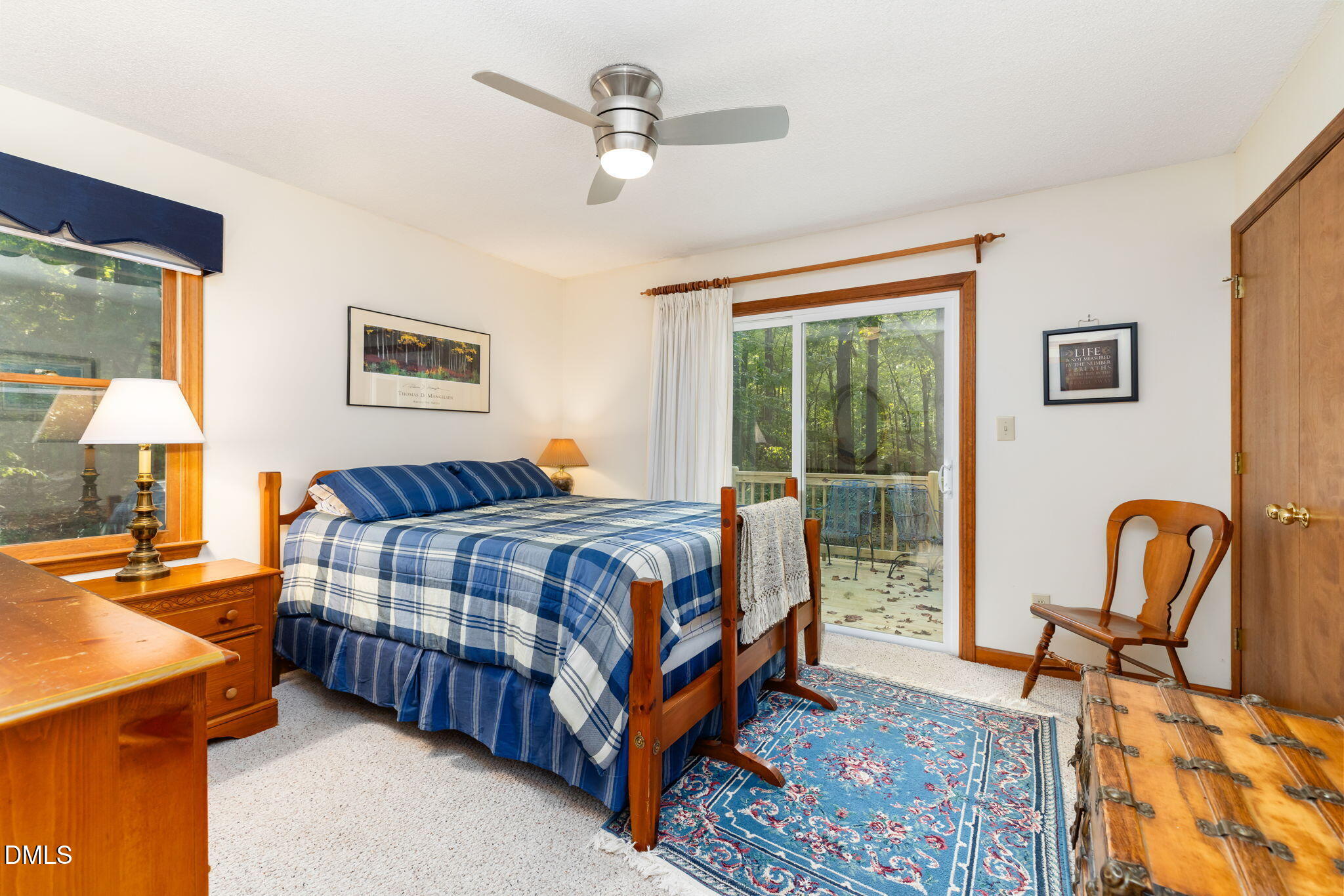 1873 Mill Creek Road Clarksville, VA 23927 - Photo 34 of 50 a bedroom with a bed chair and window