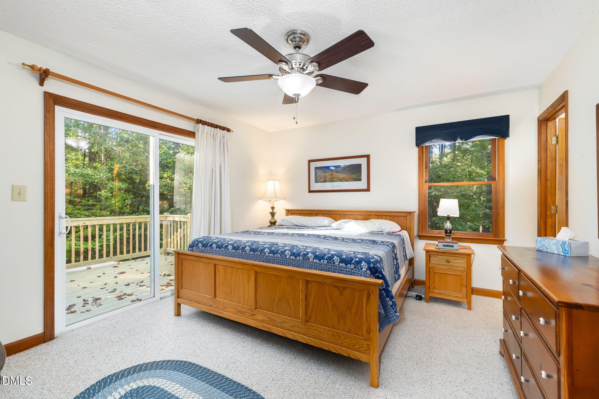 1873 Mill Creek Road Clarksville, VA 23927 - Photo 36 of 50 a bed sitting in a spacious bedroom next to a window
