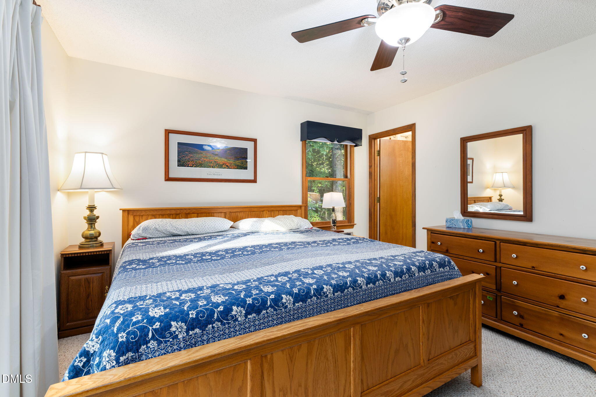 1873 Mill Creek Road Clarksville, VA 23927 - Photo 37 of 50 a bedroom with a large bed and a dresser