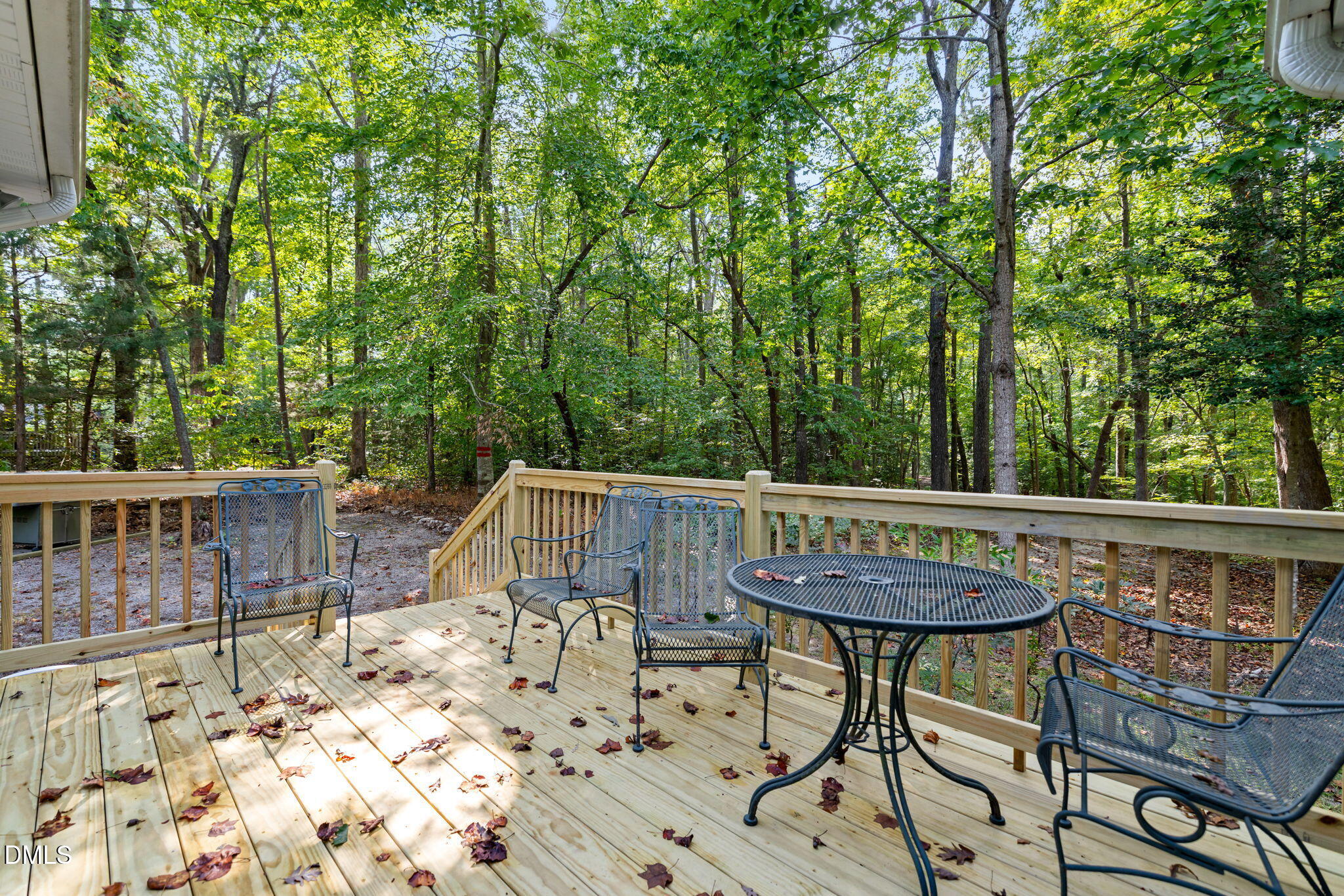 1873 Mill Creek Road Clarksville, VA 23927 - Photo 6 of 50 a view of balcony with wooden floor and outdoor seating