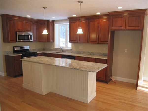 10 July Sudbury, MA 01776 - Photo 2 of 7 a kitchen with stainless steel appliances granite countertop a refrigerator a sink a stove and a wooden floors