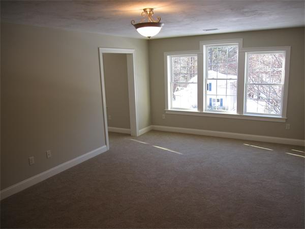 10 July Sudbury, MA 01776 - Photo 5 of 7 an empty room with a empty space and windows