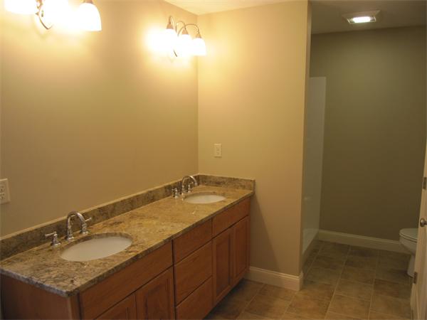 10 July Sudbury, MA 01776 - Photo 7 of 7 a bathroom with a granite countertop sink and a mirror