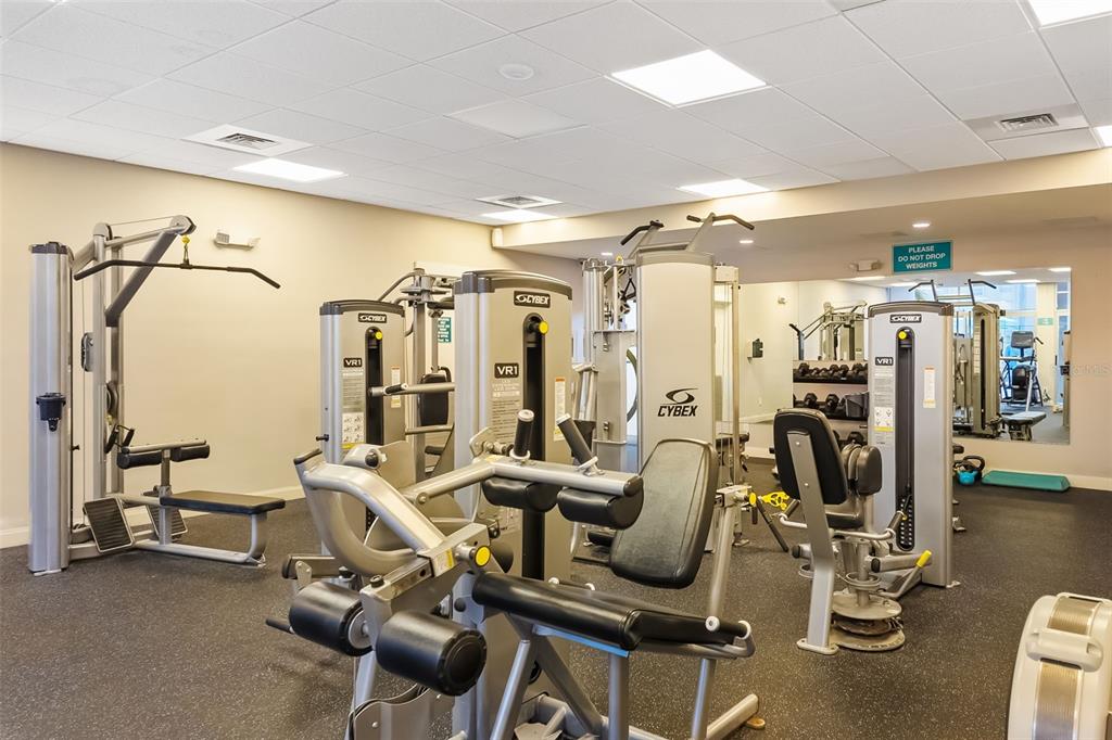5961 Midnight Pass Road, Unit 319 Sarasota, FL 34242 - Photo 26 of 34 a view of a room with gym equipment