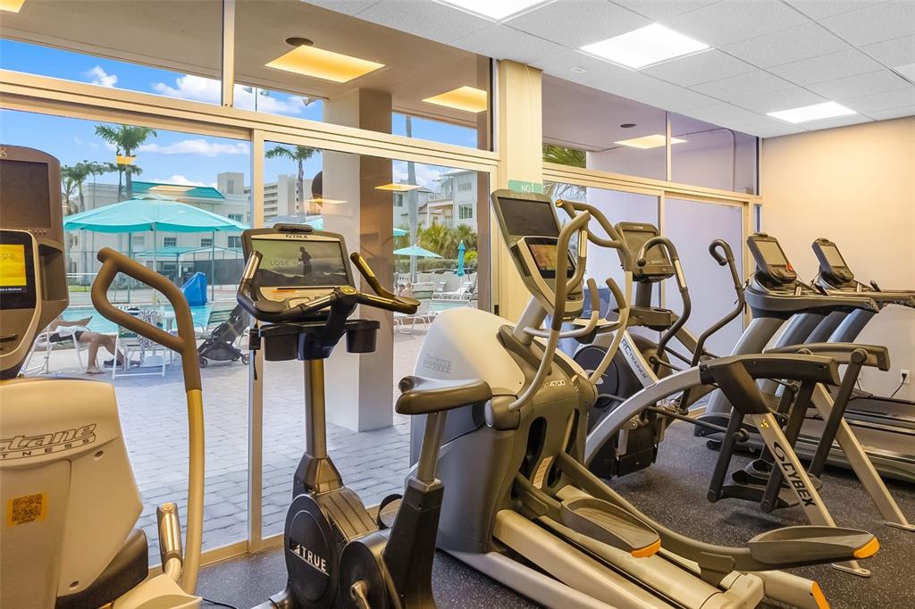 5961 Midnight Pass Road, Unit 319 Sarasota, FL 34242 - Photo 27 of 34 a view of a room with gym equipment