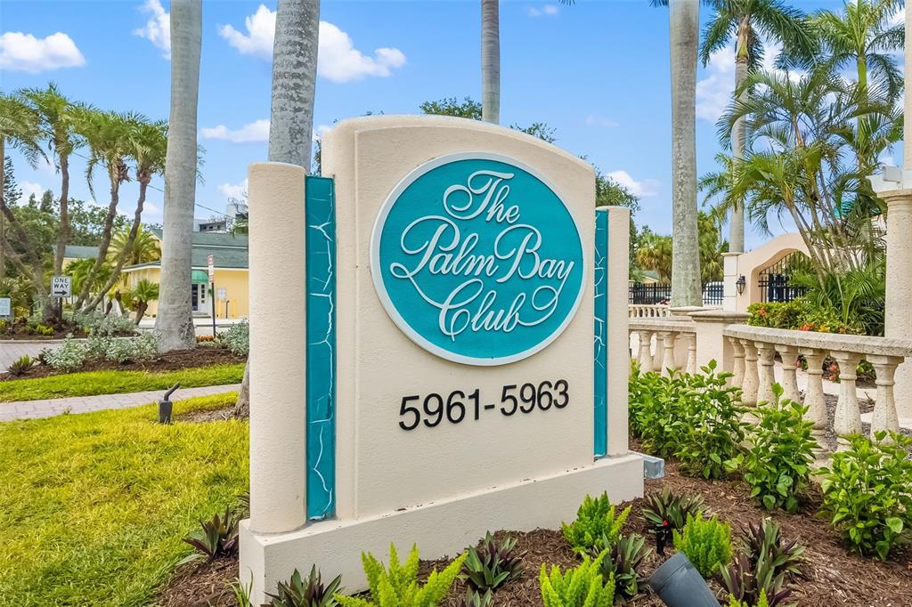 5961 Midnight Pass Road, Unit 319 Sarasota, FL 34242 - Photo 28 of 34 a sign on the side of a building