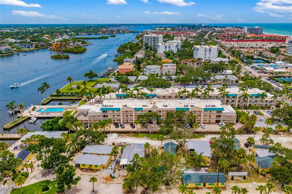 5961 Midnight Pass Road, Unit 319 Sarasota, FL 34242 - Photo 34 of 34 an aerial view of residential houses with outdoor space