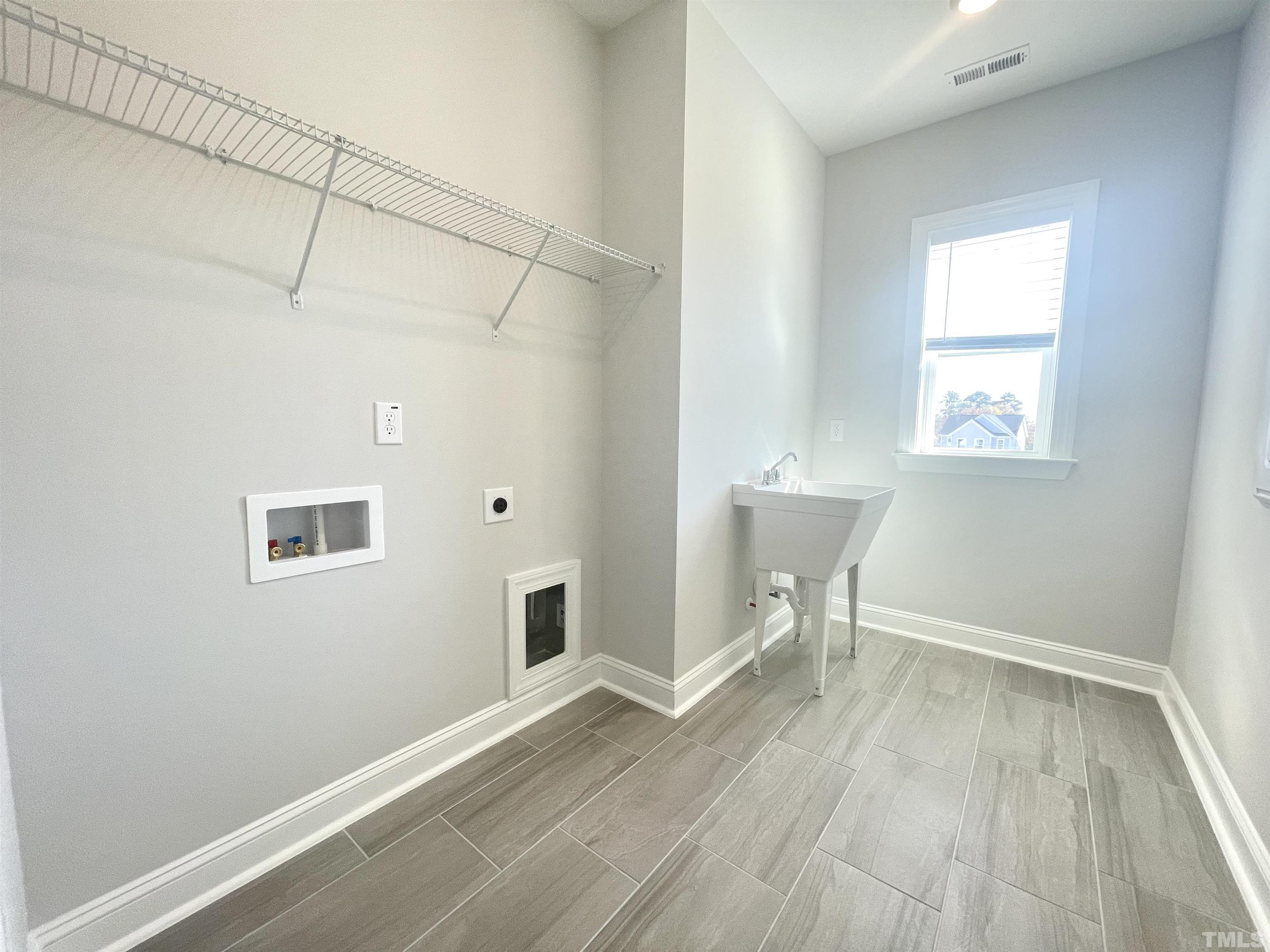 191 Edge Of Auburn Boulevard Raleigh, NC 27610 - Photo 22 of 24 a view of empty room with wooden floor and fan