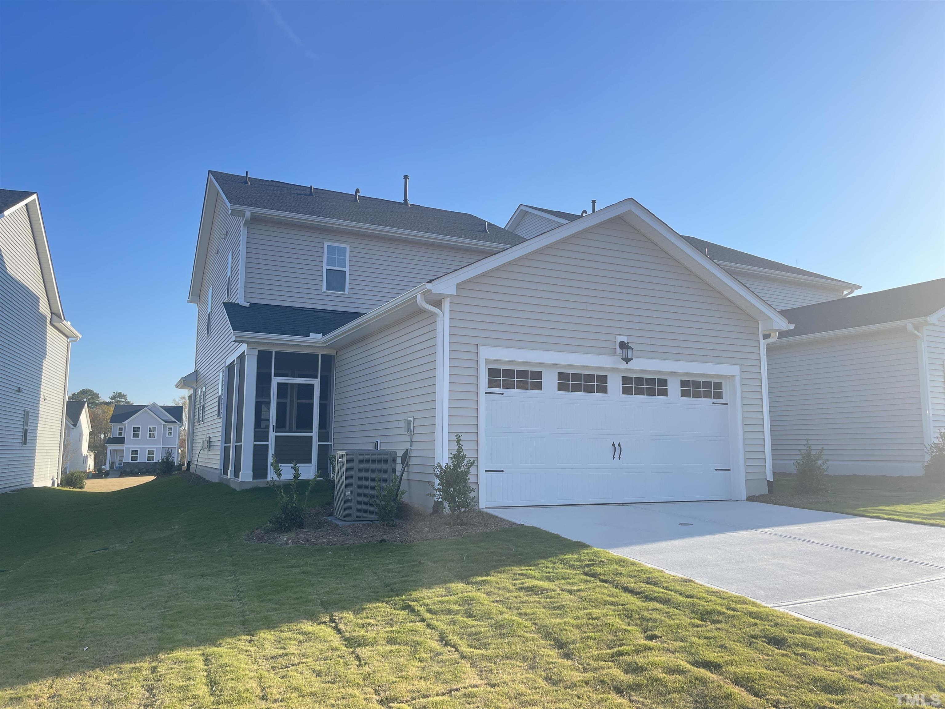191 Edge Of Auburn Boulevard Raleigh, NC 27610 - Photo 24 of 24 a view of a house with a backyard