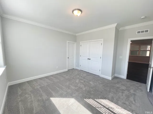 an empty room with closet