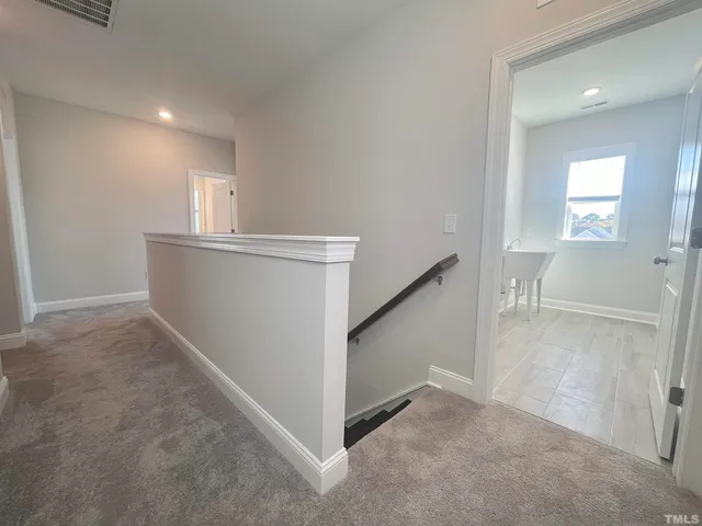a view of hallway with stairs