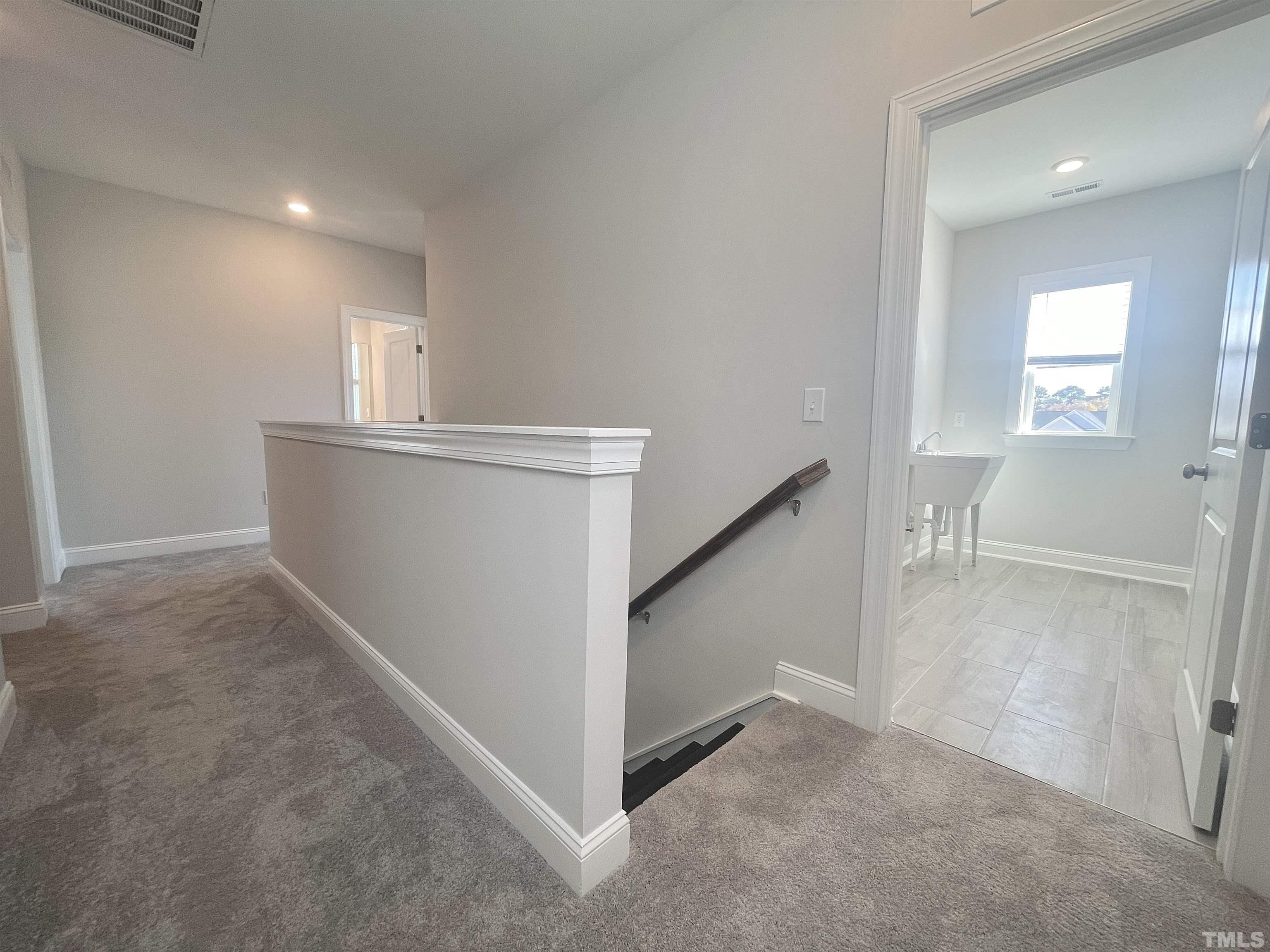 191 Edge Of Auburn Boulevard Raleigh, NC 27610 - Photo 10 of 24 a view of hallway with stairs