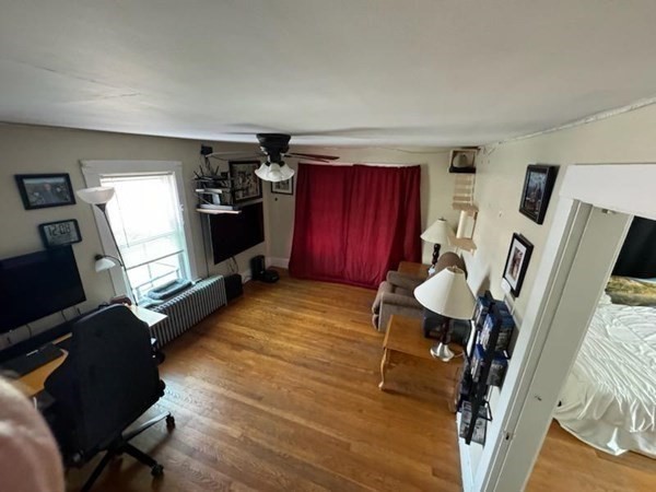 169 Main Street, Unit 1 Avon, MA 02322 - Photo 5 of 12 a view of livingroom with furniture hardwood floor and furniture