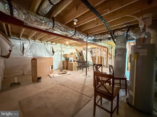 a view of a garage with wooden floor