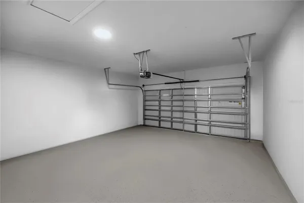 a view of a room with white walls