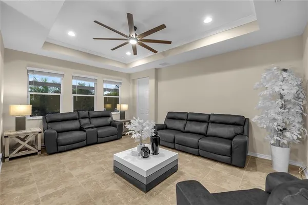 a view of a big room with furniture and a livingroom