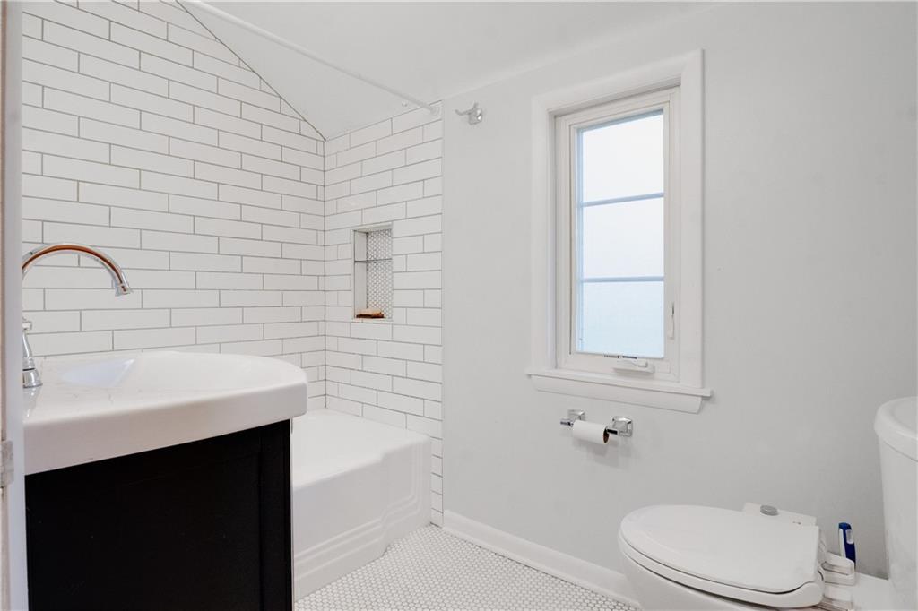 406 Bower Hill Road Pittsburgh, PA 15228 - Photo 18 of 26 a bathroom with a sink a toilet and shower