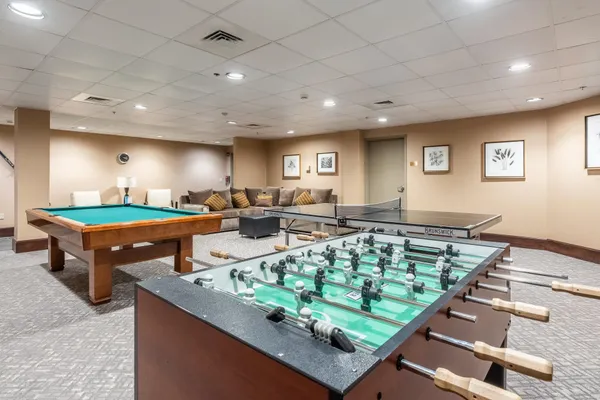 a large room with lots of table and chairs