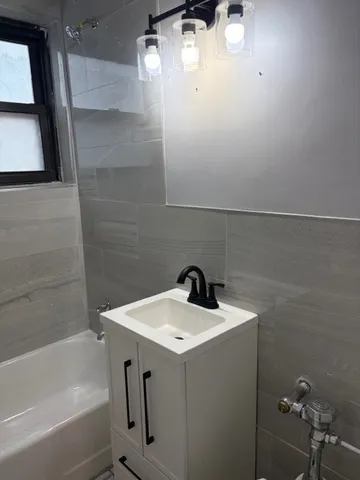 a bathroom with a large window