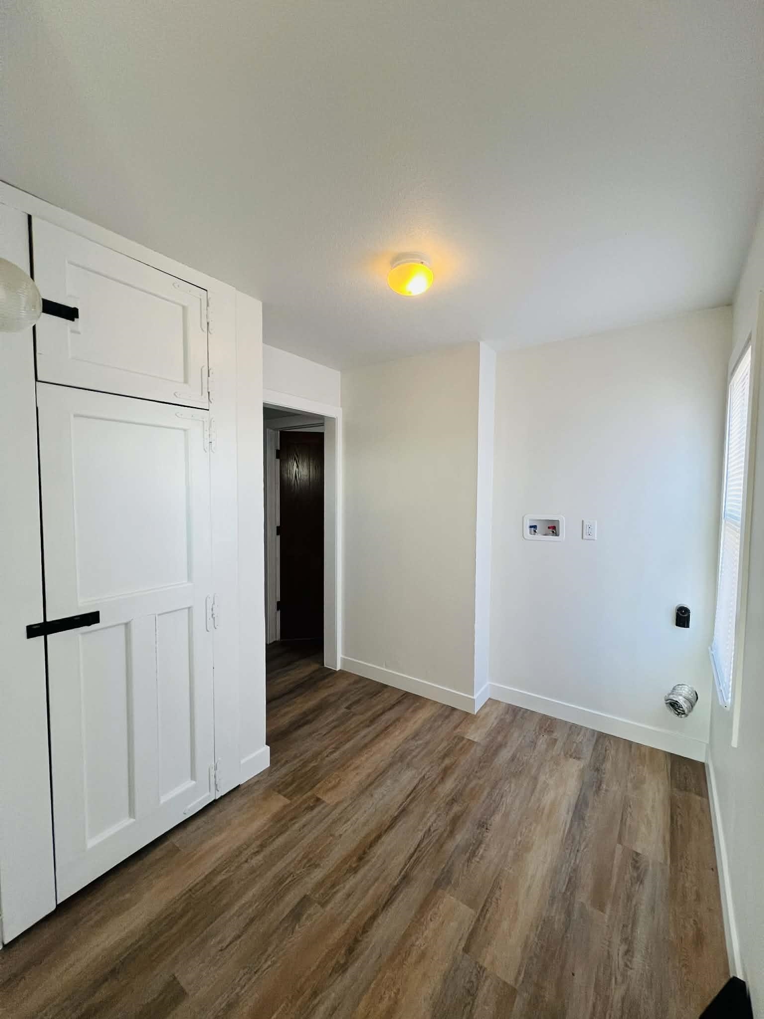 1625 South County Divide Road Pearl City, IL 61062 - Photo 20 of 30 a view of an empty room with wooden floor