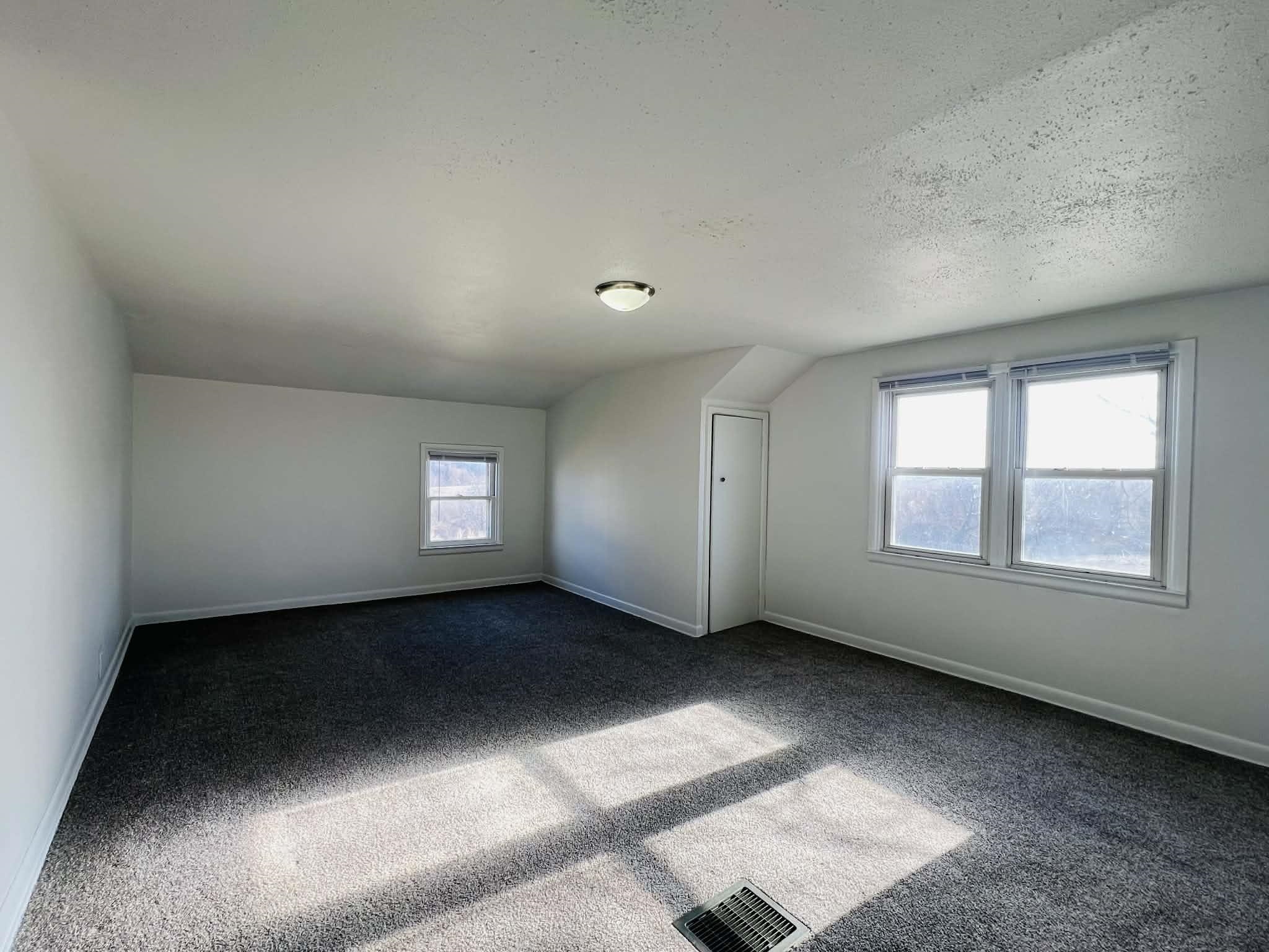 1625 South County Divide Road Pearl City, IL 61062 - Photo 24 of 30 an empty room with a empty space and windows