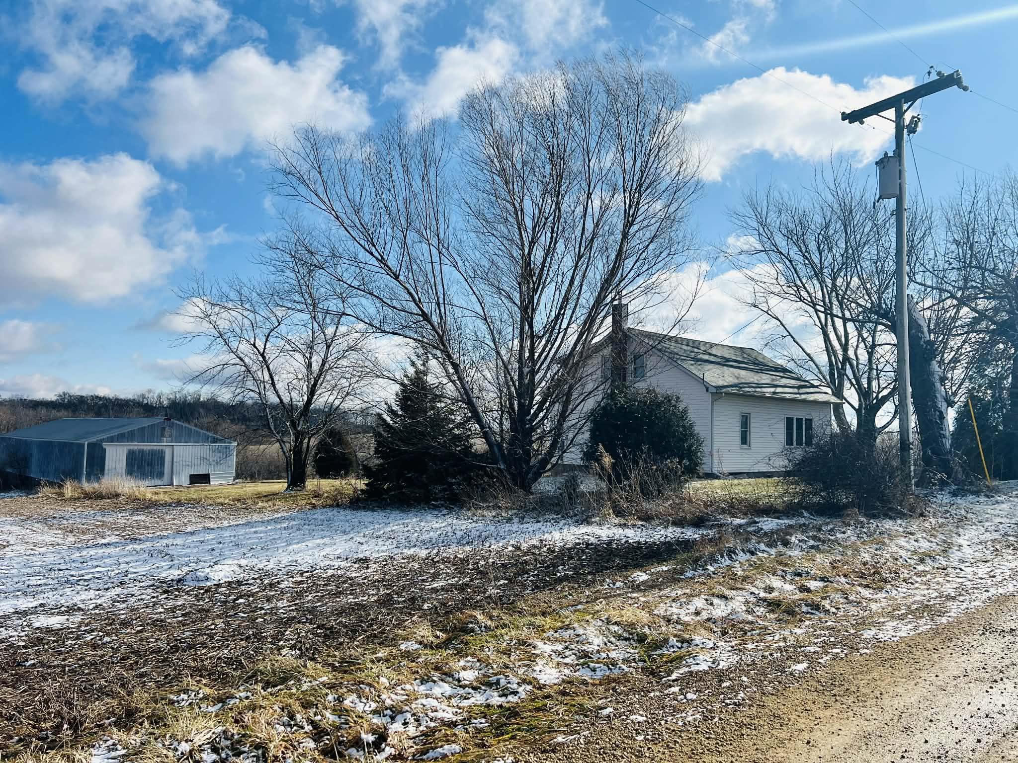 1625 South County Divide Road Pearl City, IL 61062 - Photo 27 of 30 a view of a house with a yard