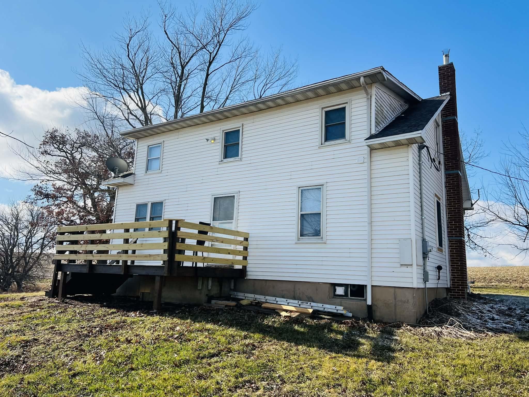 1625 South County Divide Road Pearl City, IL 61062 - Photo 5 of 30 a view of a house with a yard