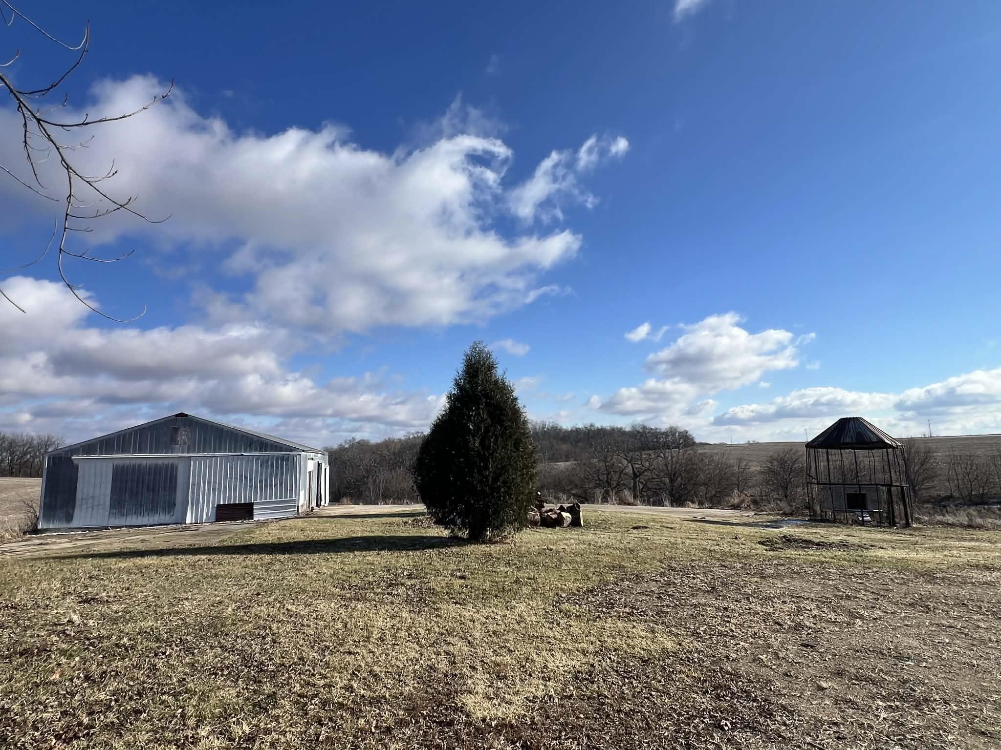 1625 South County Divide Road Pearl City, IL 61062 - Photo 7 of 30 a view of a house with a yard