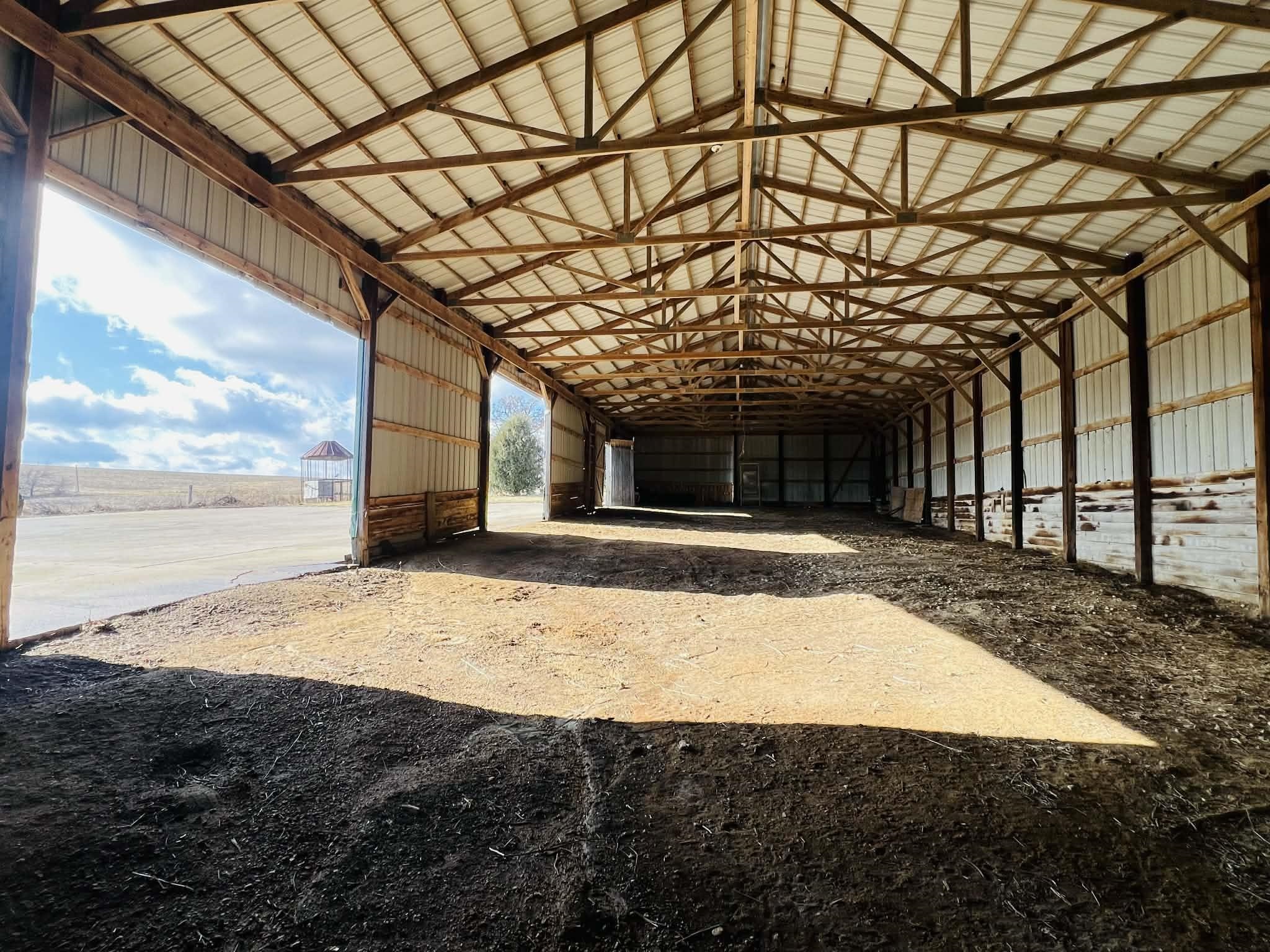 1625 South County Divide Road Pearl City, IL 61062 - Photo 10 of 30 a view of yellow house with a yard