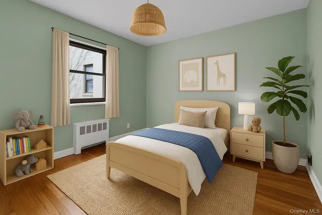 a bed room with a bed and a potted plant