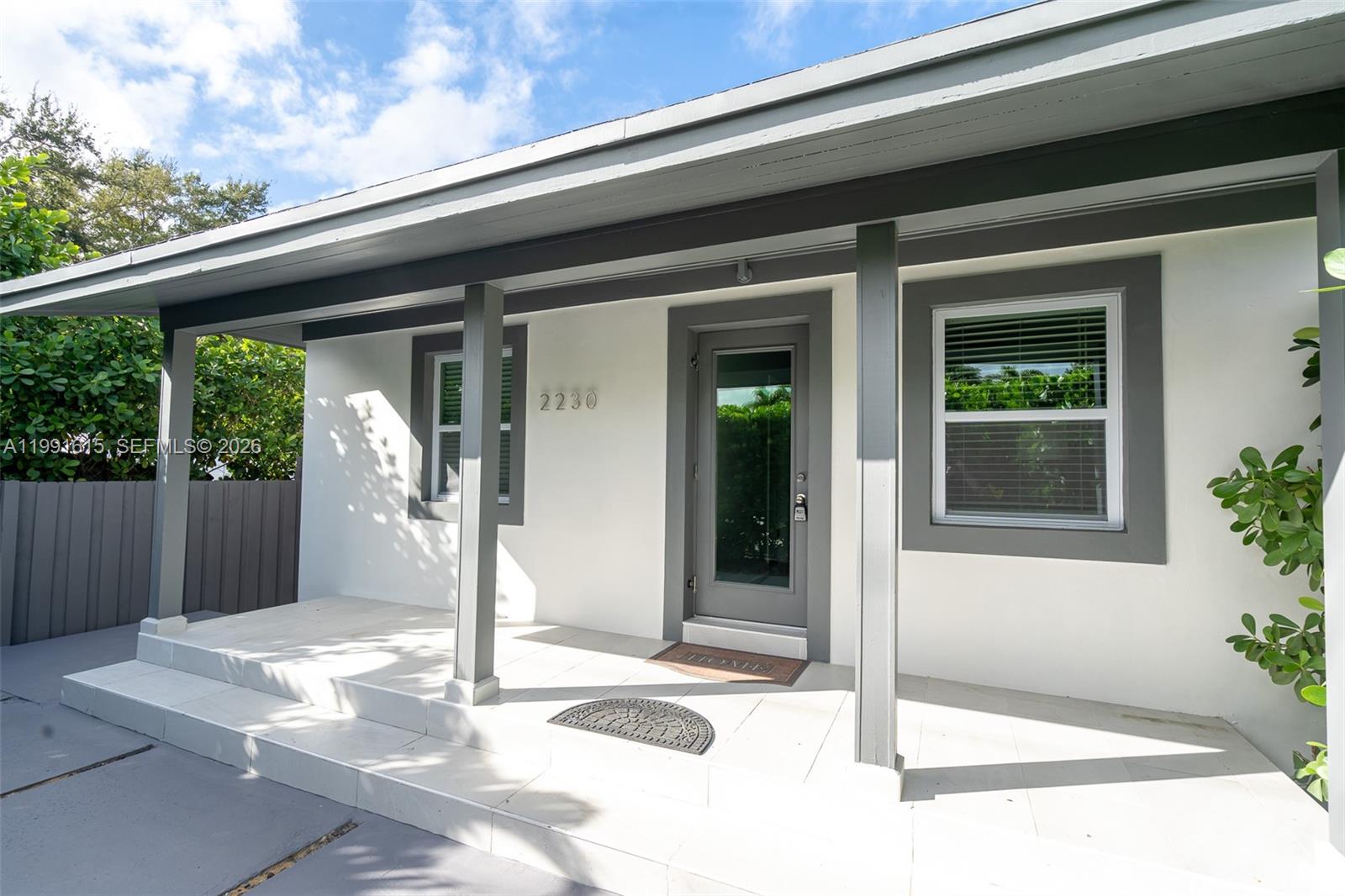 2230 Southwest 60th Court Miami, FL 33155 - Photo 1 of 35 a front view of a house