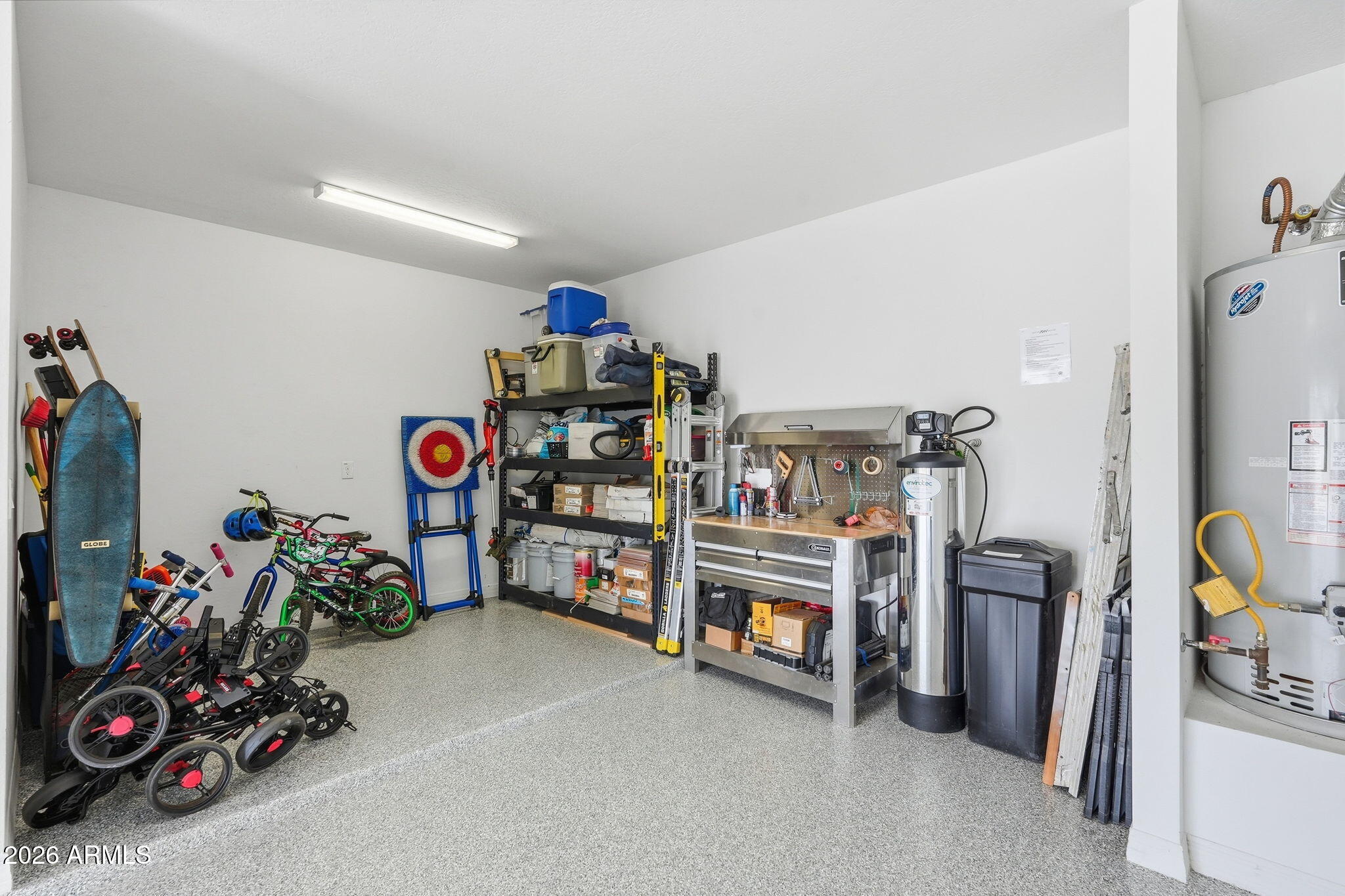 22607 East Russet Road Queen Creek, AZ 85142 - Photo 46 of 64 a view of a garage with a lot of stuff and toys