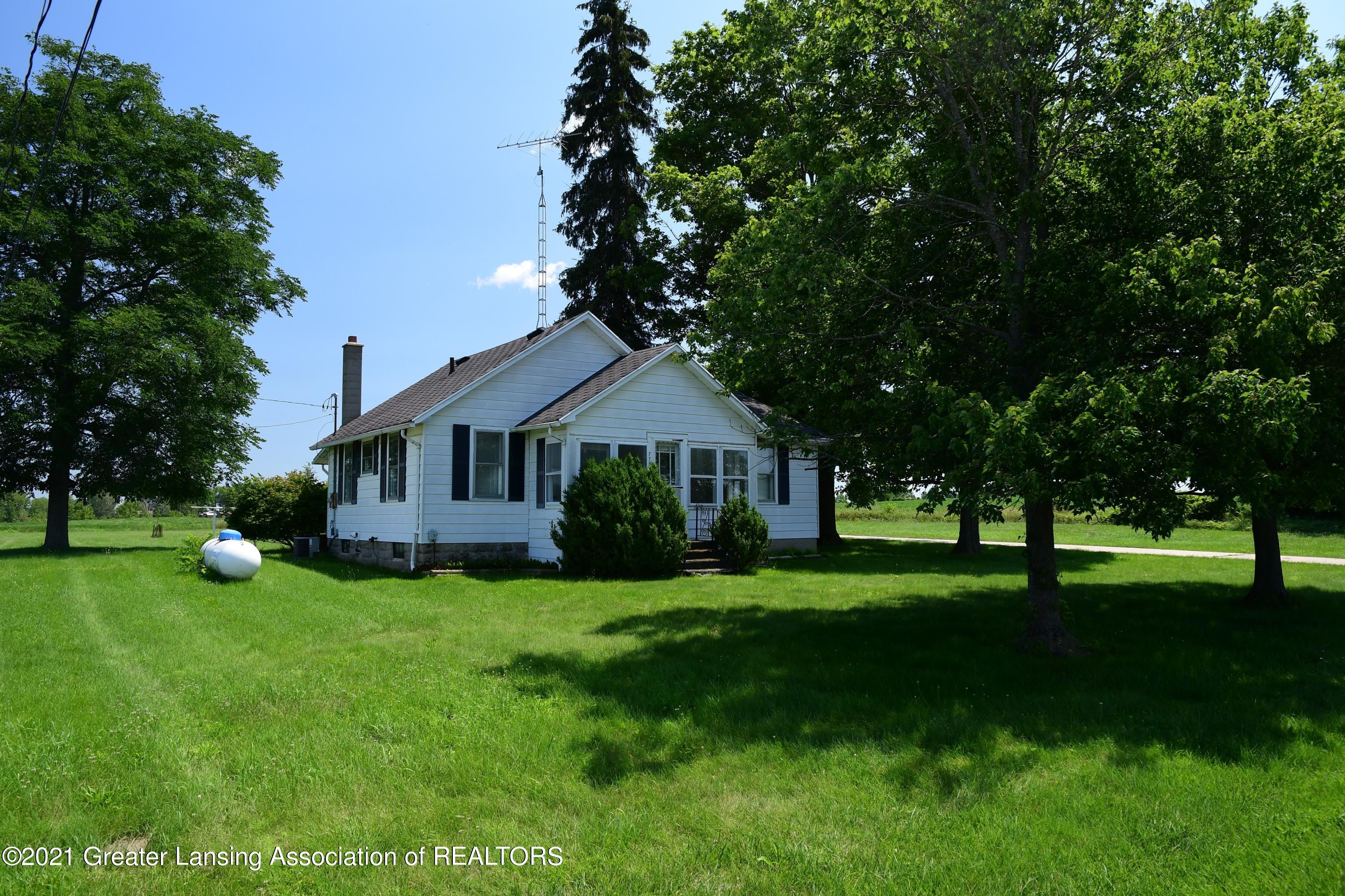 775 Tuttle Road Mason, MI 48854 - Photo 2 of 46 Front