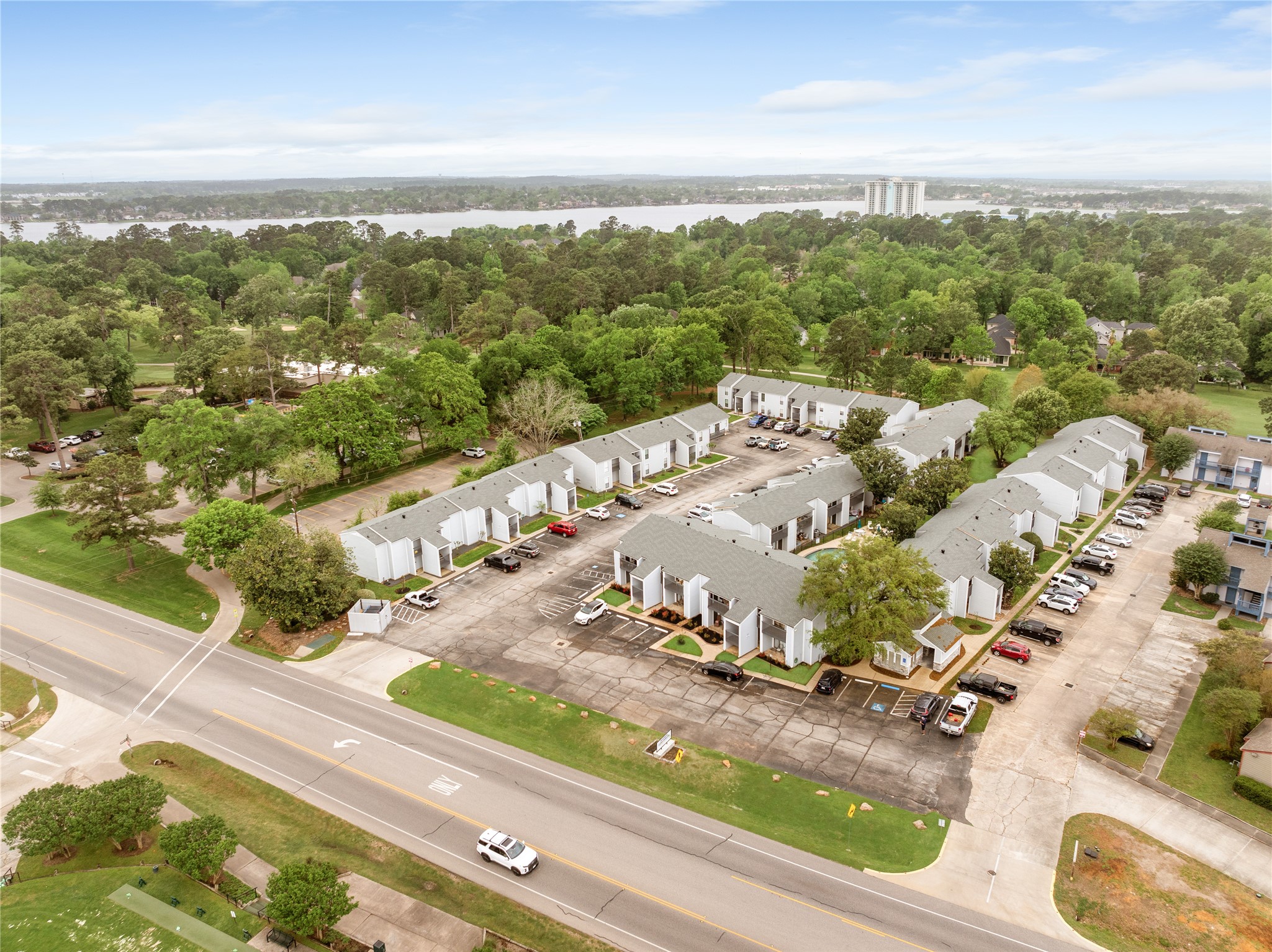 13151 Walden Road, Unit 161 Montgomery, TX 77356 - Photo 10 of 19 Easy access from Walden Road, the first building in the center on the back side by the pool is your new home.