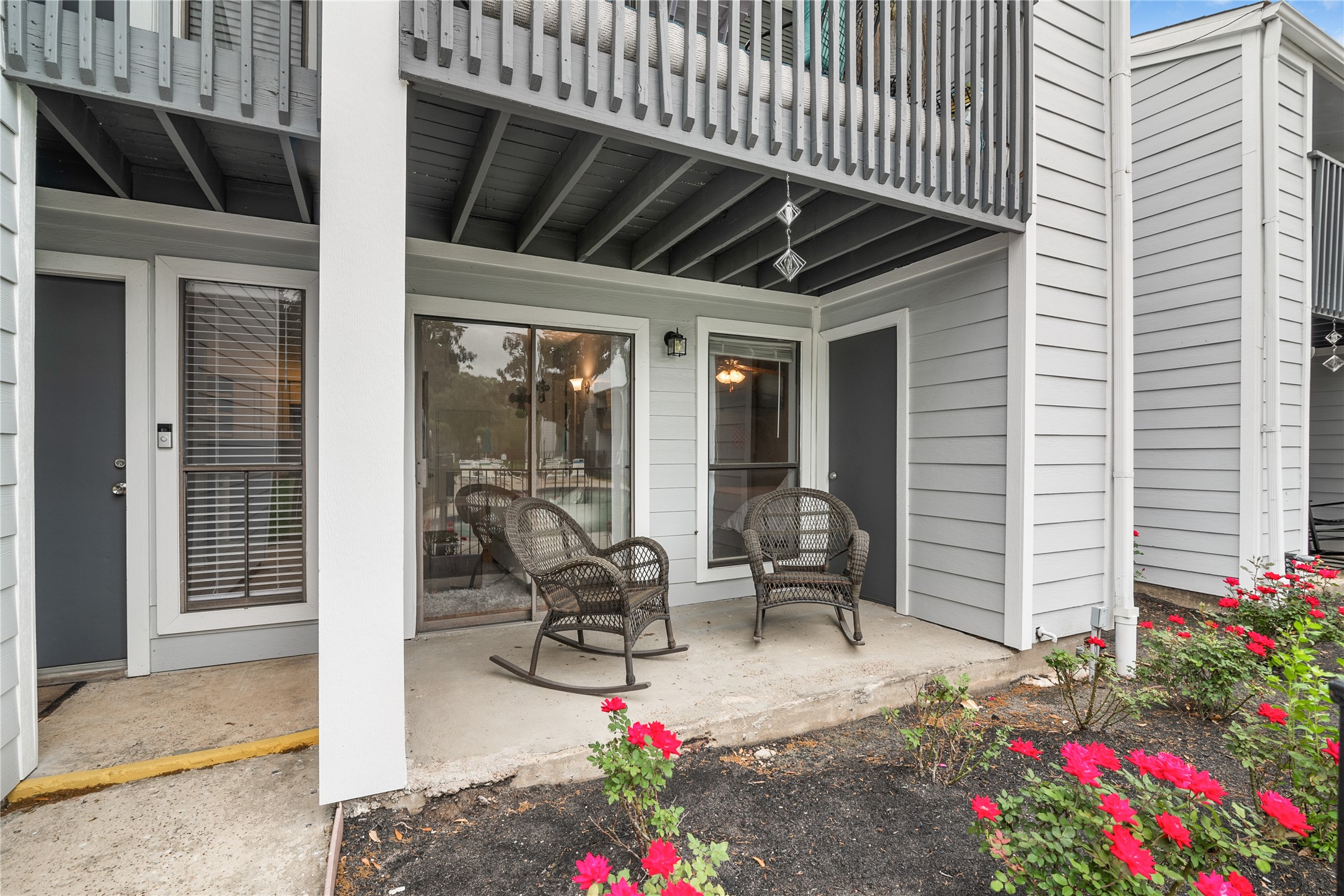 13151 Walden Road, Unit 161 Montgomery, TX 77356 - Photo 13 of 19 Enjoy your secluded patio with beautiful roses while overlooking the pool.