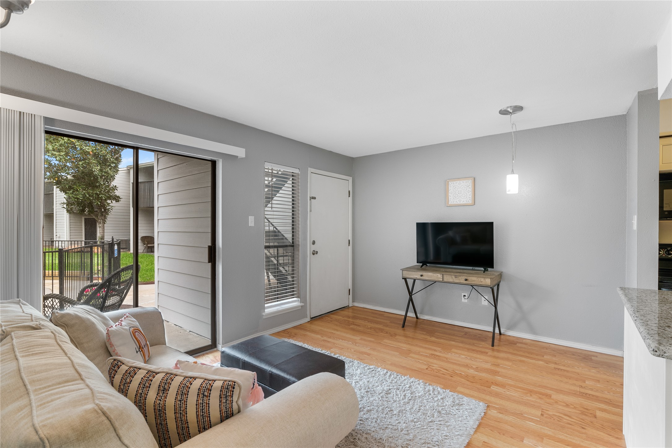 13151 Walden Road, Unit 161 Montgomery, TX 77356 - Photo 3 of 19 Wood laminate floor throughout, no carpet.